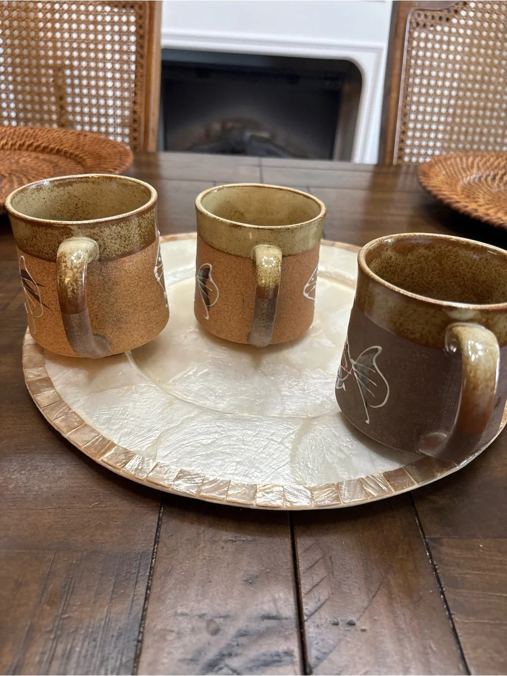 Three vintage stoneware pottery mugs with hand painted fish